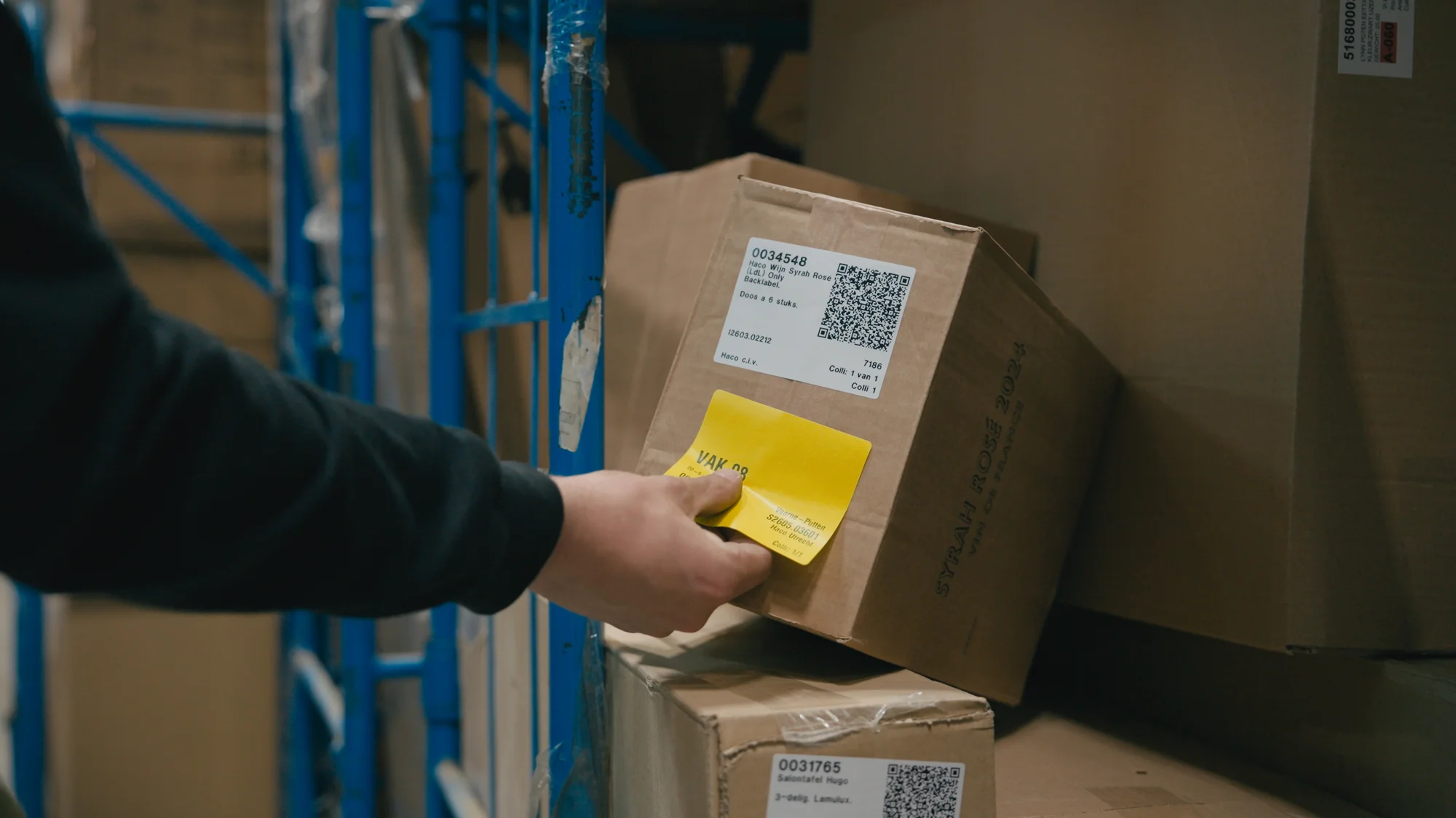 Racks holding recorded stock in a warehouse